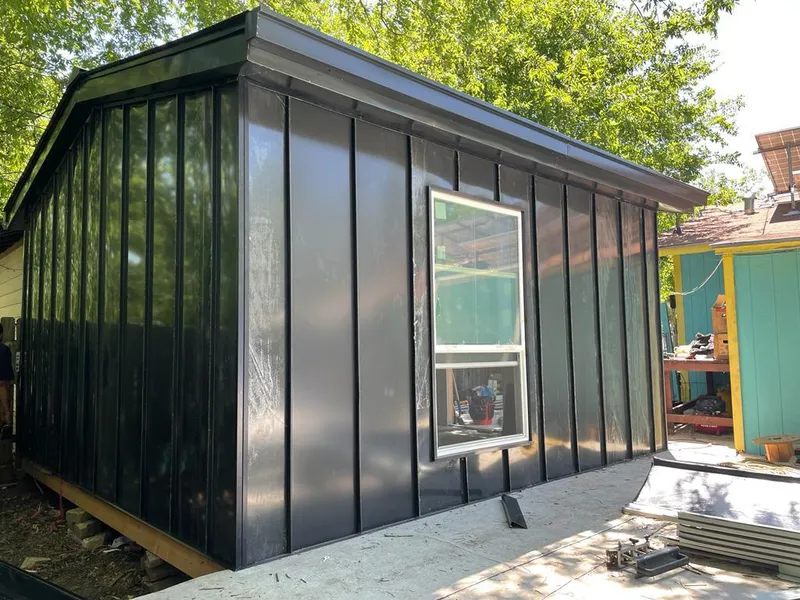 Black standing seam metal wall panels for Roof Inspection in South Londonderry