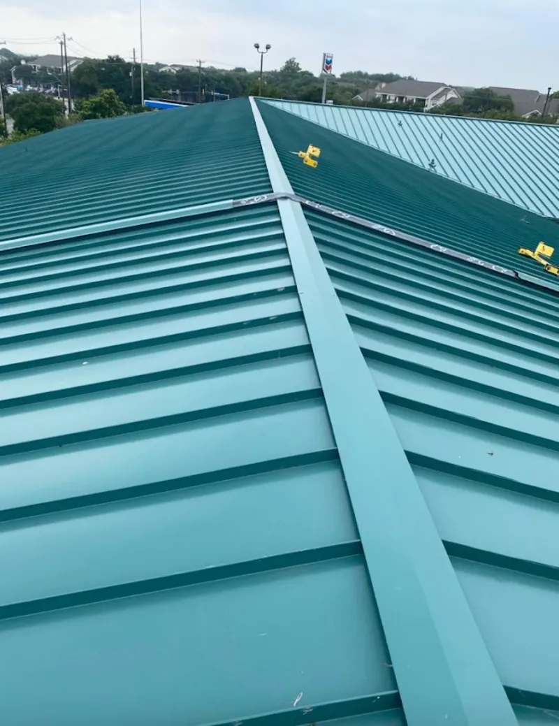 Green commercial metal roof ridge and valley for Metal Roof Repair in South Londonderry